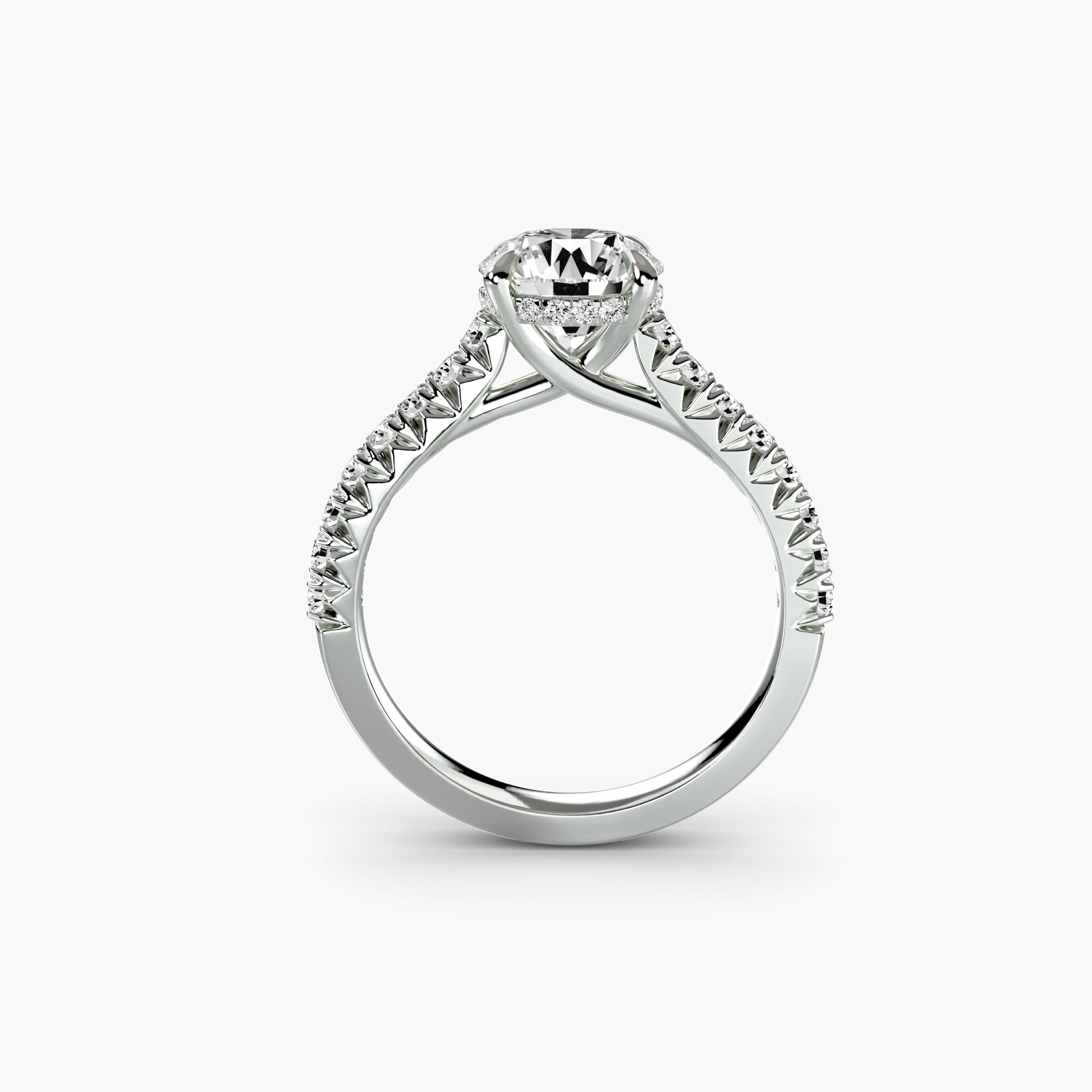 The MICHAEL ISAAC Solitaire with Pavé 5 is a white gold or platinum ring featuring a large round diamond center and pavé-set band, offering everyday luxury. Shown upright on a white background.