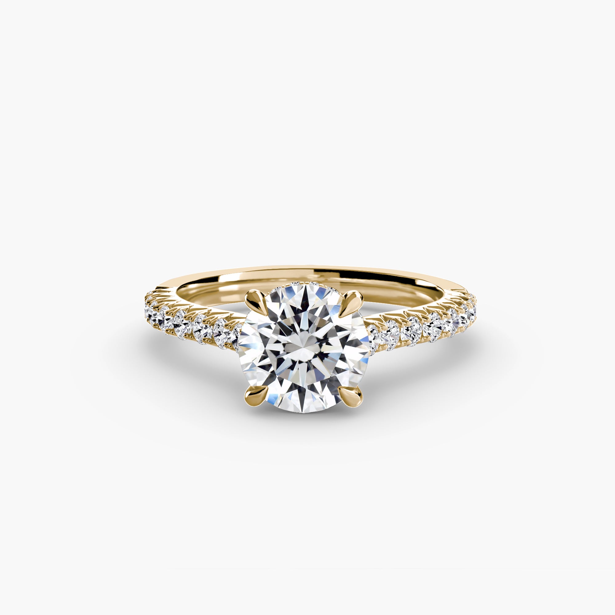 The MICHAEL ISAAC Solitaire with Pavé 5 is a gold ring with a large round diamond center stone and a pavé-set band accented with sparkling diamonds, shown on a white background for timeless everyday luxury.