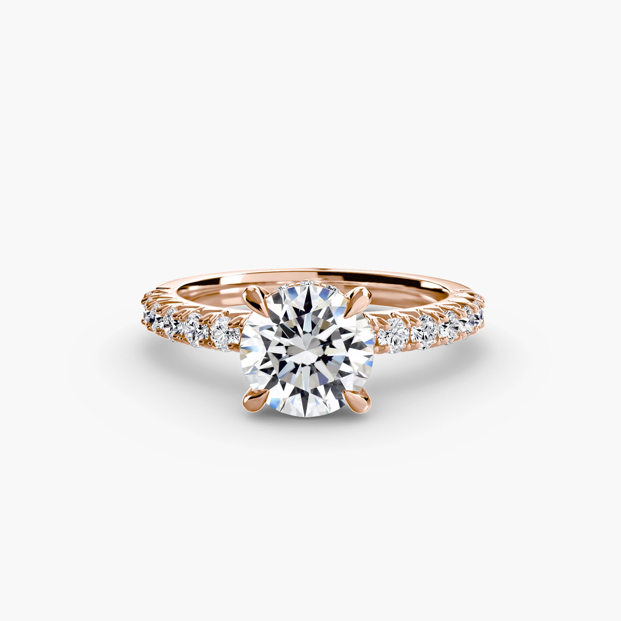 The MICHAEL ISAAC Solitaire with Pavé 6 is a rose gold ring featuring a round-cut center diamond and pavé-set diamonds along the band, elegantly displayed against a plain white background.
