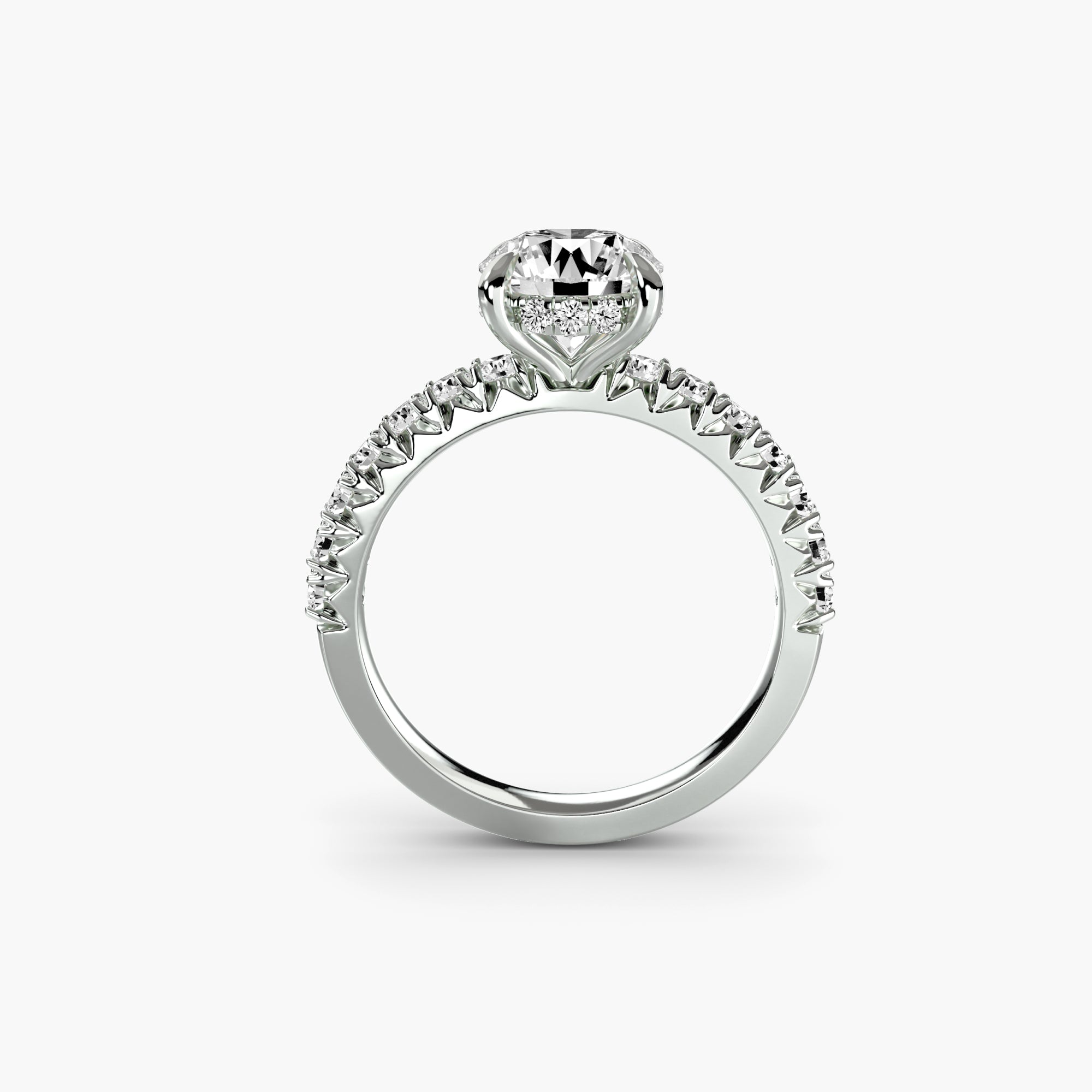 The MICHAEL ISAAC Solitaire with Pavé 6 is a silver ring with a large round center diamond and a pavé-set band of smaller diamonds, shown on a white background.